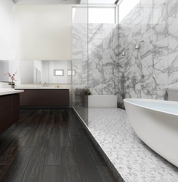 marble shower and tub with tile flooring